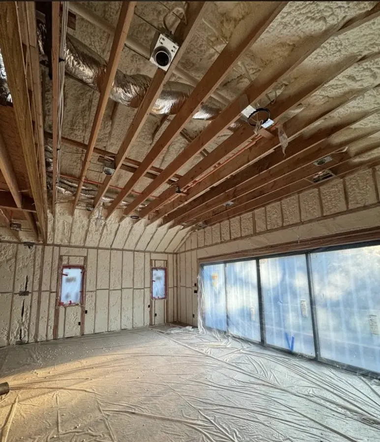 Interior walls and ceiling insulated with spray foam during new construction in Frisco